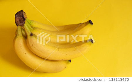 Bananas on a yellow background 138115470