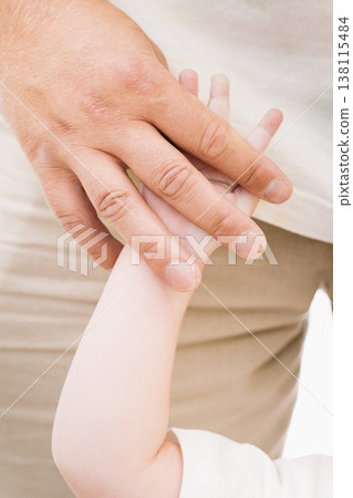 Adult and Child Holding Hands Demonstrating Connection Adult and Child Holding Hands Demonstrating Connection 138115484