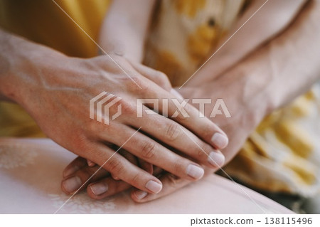 Hands of Parents and Child Portraying Unity and Support 138115496