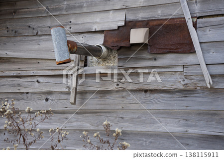 Old wooden house and corrugated iron chimney Old wooden house and corrugated iron chimney 138115911