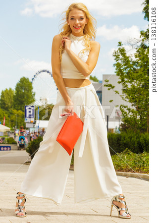 Woman wearing crop top and culottes 138116108