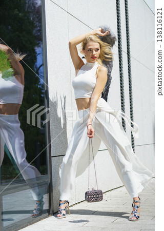 Woman wearing crop top and culottes 138116121