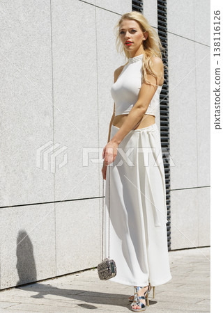 Woman wearing crop top and culottes 138116126