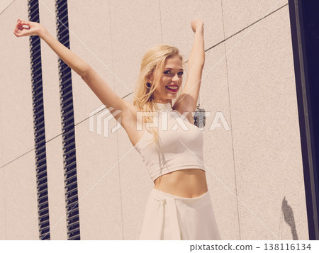 Fashionable woman in city Fashionable woman in city 138116134