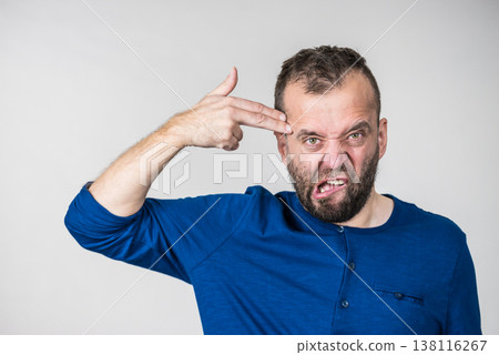 Crazy man pointing with hand gun Crazy man pointing with hand gun 138116267