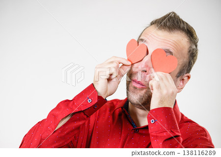 Man in love with hearts on eyes Man in love with hearts on eyes 138116289