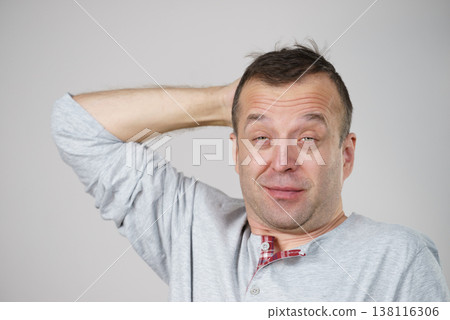 Sleepy confused man Sleepy confused man 138116306