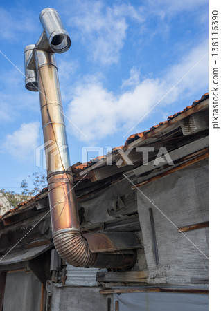 Old corrugated iron chimney Old corrugated iron chimney 138116390