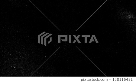 A grunge texture with white dust and noise on a black background (for overlay). 138116451