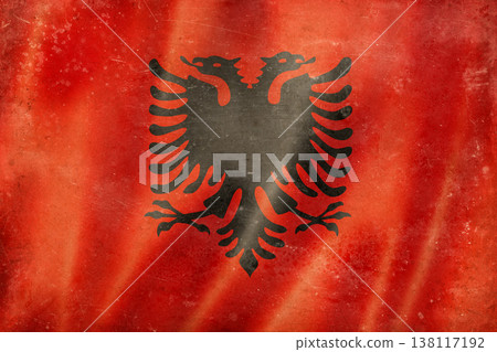 Old vintage flag of Albania, worn and stained Old vintage flag of Albania, worn and stained 138117192