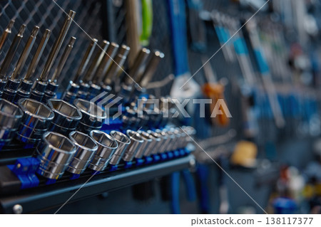 Detailed view of workshop socket wrenches and hanging 138117377