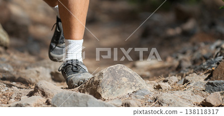 Walking or running exercise legs on rocky footpath in bright forest achievement fitness adventure and exercising in spring or summer nature motivation and inspirational activity Walking or running exercise legs on rocky footpath in bright forest achievement fitness adventure and exercising in spring or summer nature motivation and inspirational activity 138118317
