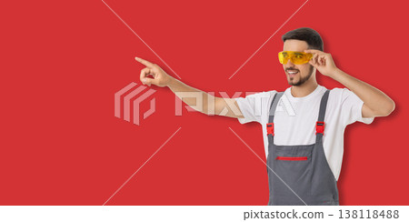 Occupation, Young man gestures with sunglasses and work clothes Occupation, Young man gestures with sunglasses and work clothes 138118488