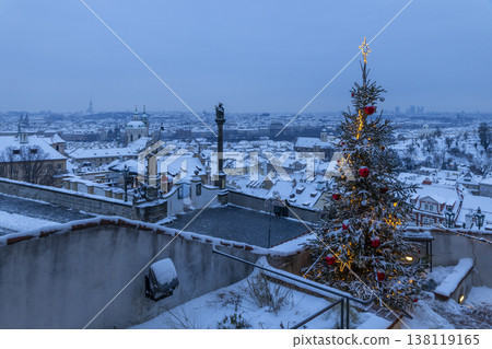 Christmas tree decorating snowy Prague city skyline Christmas tree decorating snowy Prague city skyline 138119165
