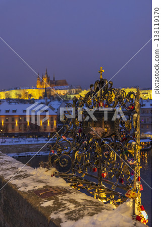 Touching holy relief on Karluv most, Prague with castle view Touching holy relief on Karluv most, Prague with castle view 138119170