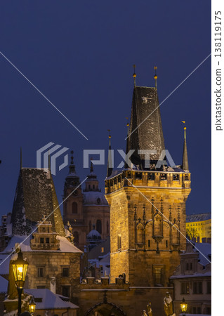 Charles Bridge architecture and snow in Prague at dusk 138119175