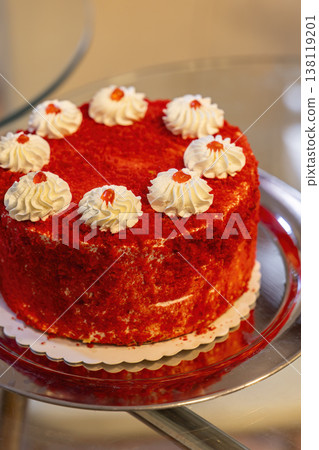 Red velvet cake with cream cheese frosting displaying dessert Red velvet cake with cream cheese frosting displaying dessert 138119201
