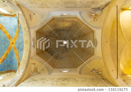 Octagonal dome and vaulted ceiling inside historic Italian church 138119275