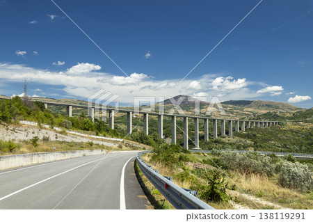 Highway viaduct extending across valley in Agnone, Italy Highway viaduct extending across valley in Agnone, Italy 138119291