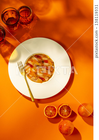 Refreshing ceviche with blood orange on orange background 138119331