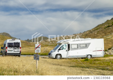 Camper vans parked near a no parking sign in Vinadio 138119368