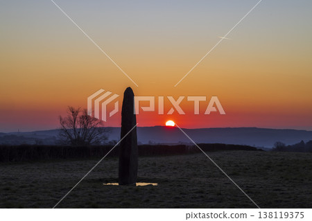 Ancient standing stone marking winter solstice sunrise at Couches Ancient standing stone marking winter solstice sunrise at Couches 138119375