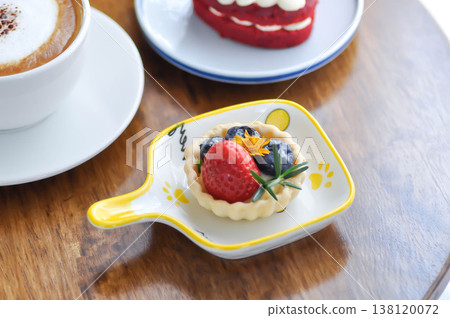 cheese tart , tart with strawberry and blueberry topping or strawberry tart or strawberry cheese tart cheese tart , tart with strawberry and blueberry topping or strawberry tart or strawberry cheese tart 138120072
