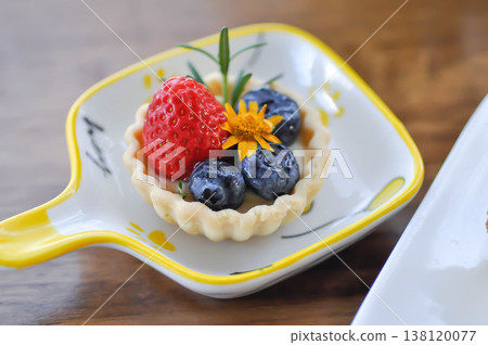 cheese tart , tart with strawberry and blueberry topping or strawberry tart or strawberry cheese tart cheese tart , tart with strawberry and blueberry topping or strawberry tart or strawberry cheese tart 138120077