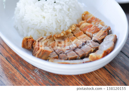 deep fried pork or rice topped with crispy pork or pork and rice or sliced pork and rice deep fried pork or rice topped with crispy pork or pork and rice or sliced pork and rice 138120155