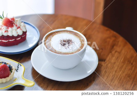 hot coffee, cappuccino coffee or latte coffee or flat white and cake 138120256