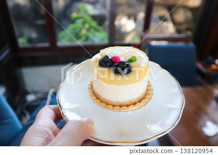 lemon cheese tart or lemon cheesecake with lemon and blueberry topping lemon cheese tart or lemon cheesecake with lemon and blueberry topping 138120954