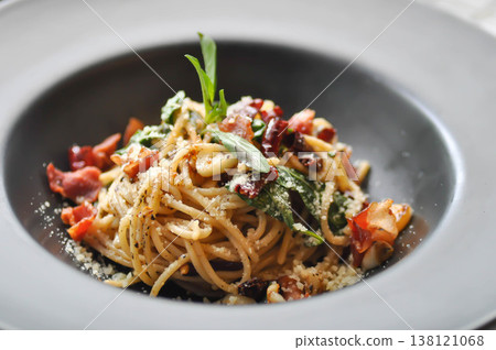 bacon spaghetti ,spaghetti or spicy spaghettior spicy pasta or bacon pasta with chili and sweet basil 138121068