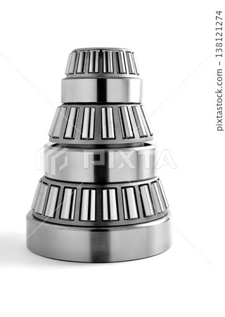 roller bearings stacked in groups in a pyramid on a white background roller bearings stacked in groups in a pyramid on a white background 138121274