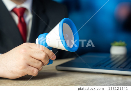 A businessman makes an announcement with a megaphone. A recruitment ad. Company news. Corporate communication strategy attracts talent and spreads business updates. Leadership drives hiring campaigns. A businessman makes an announcement with a megaphone. A recruitment ad. Company news. Corporate communication strategy attracts talent and spreads business updates. Leadership drives hiring campaigns. 138121341