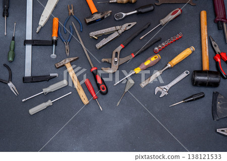 Various Hand Tools Background. Professional DIY Equipment for household. Assorted work and home renovation tool flat lay Various Hand Tools Background. Professional DIY Equipment for household. Assorted work and home renovation tool flat lay 138121533