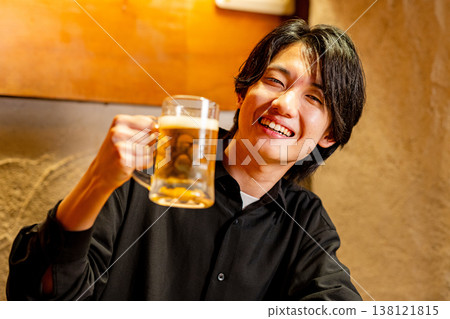 A man with beer A man with beer 138121815