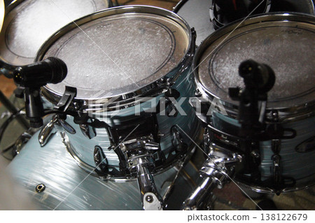 Drum set with microphones placed on the toms in a music studio  138122679