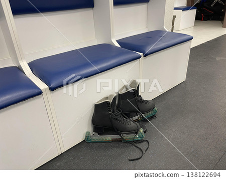 skates in the locker room skates in the locker room 138122694