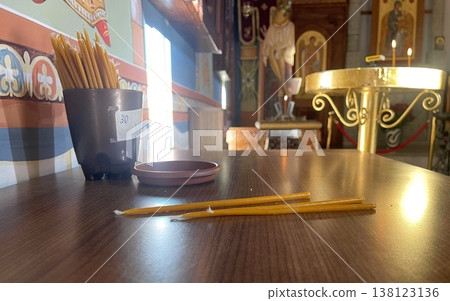 candles in the old sunny orthodox chirch 138123136