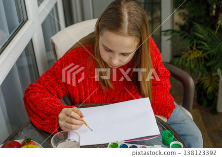 Hobby. Kid drawing. Cute child at home Hobby. Kid drawing. Cute child at home 138123392