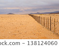 fence in desert 138124060