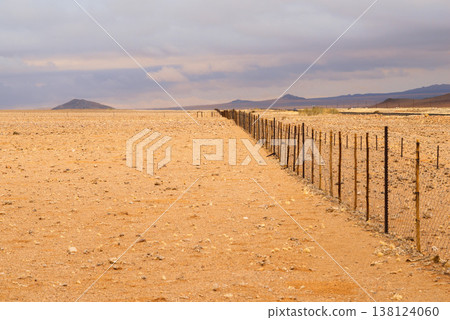 fence in desert 138124060
