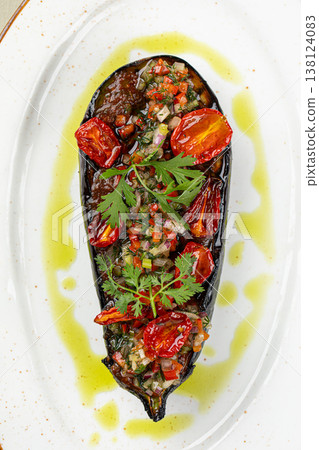 Grilled eggplant with herbs and pomegranate Grilled eggplant with herbs and pomegranate 138124083