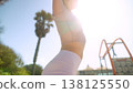 Vigorous person showcasing strength amid lively tropical greenery 138125550