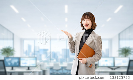 Woman/businesswoman giving directions by hand 138125733
