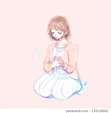 一位表情溫柔的女子,雙手交疊放在胸前。 一位表情溫柔的女子,雙手交疊放在胸前。 138126002