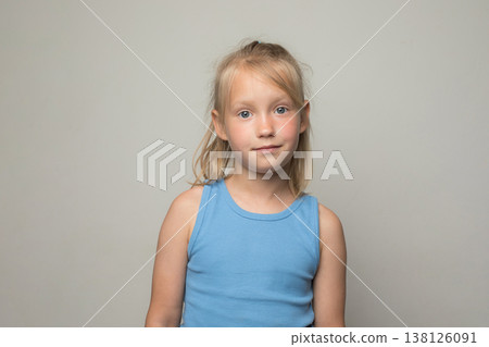Cute blond child looking at camera on white background Cute blond child looking at camera on white background 138126091