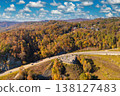 Highway road in North Carolina Appalachian mountains in fall season. Expressway lanes for fast passing of car traffic 138127483