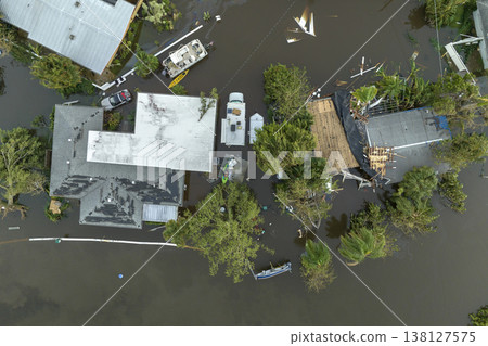 Flooded houses by hurricane Ian rainfall in Florida residential area. Consequences of natural disaster Flooded houses by hurricane Ian rainfall in Florida residential area. Consequences of natural disaster 138127575