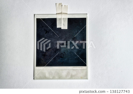 Blank photo frame with scotch tape isolated on white paper background Blank photo frame with scotch tape isolated on white paper background 138127743